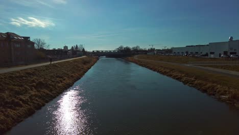 aerial drone over blue river morava in olomouc city in czech republic on sunny day