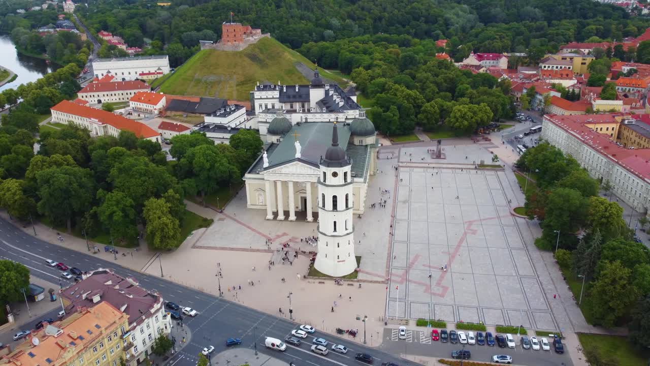 Vilnius cathedral square and gediminas' tower surrounded by lush greenery, aerial view
