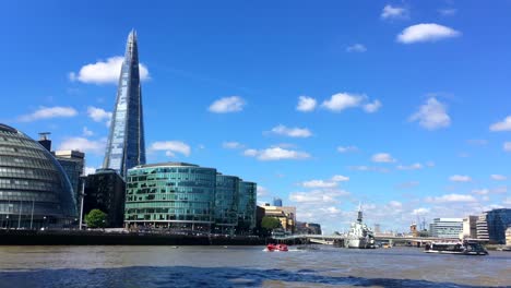 going under tower bridge, london in summer sunshine