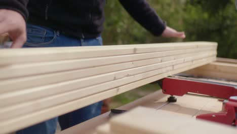 The-stacked-wood-is-inspected-by-the-craftsman