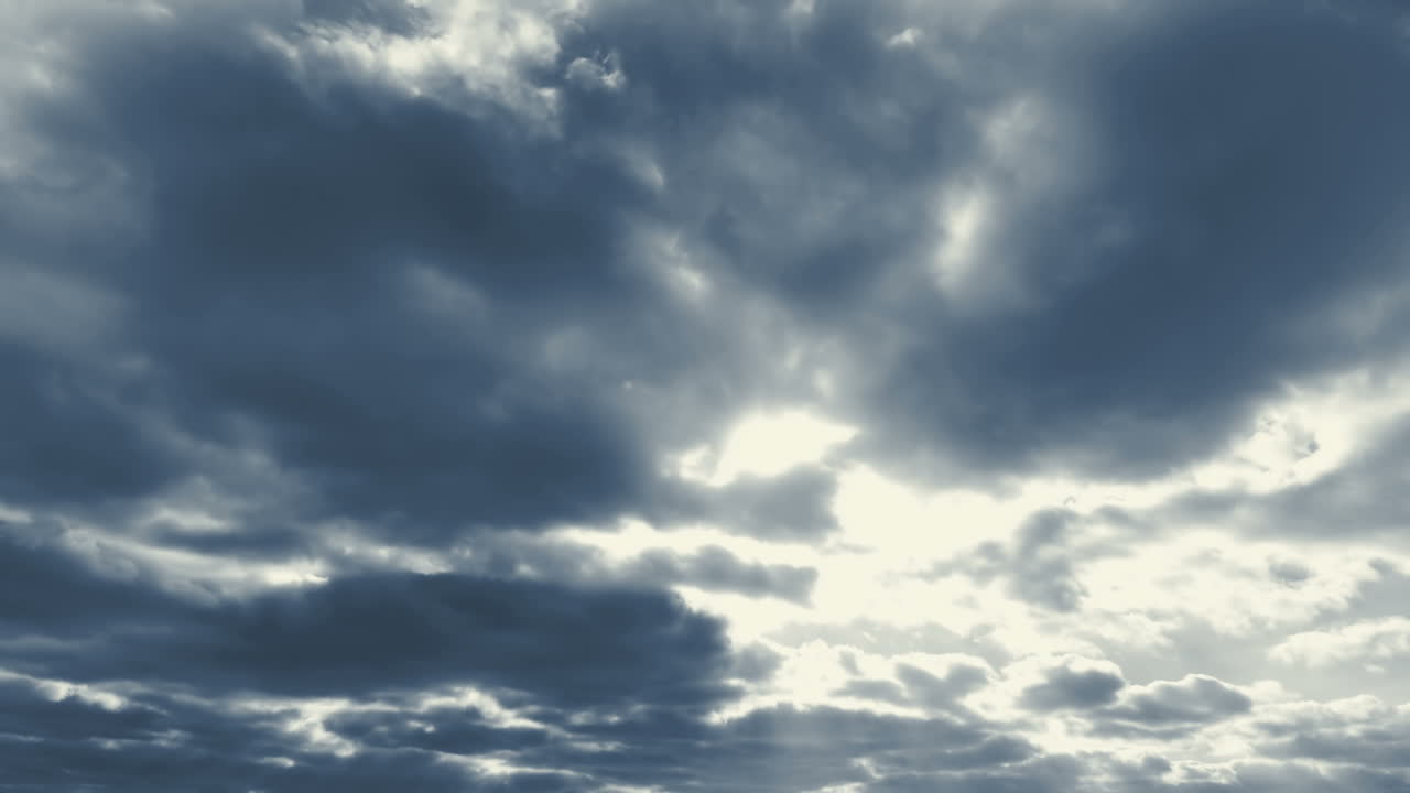 The movement of clouds in the sky. The movement of clouds in the sky