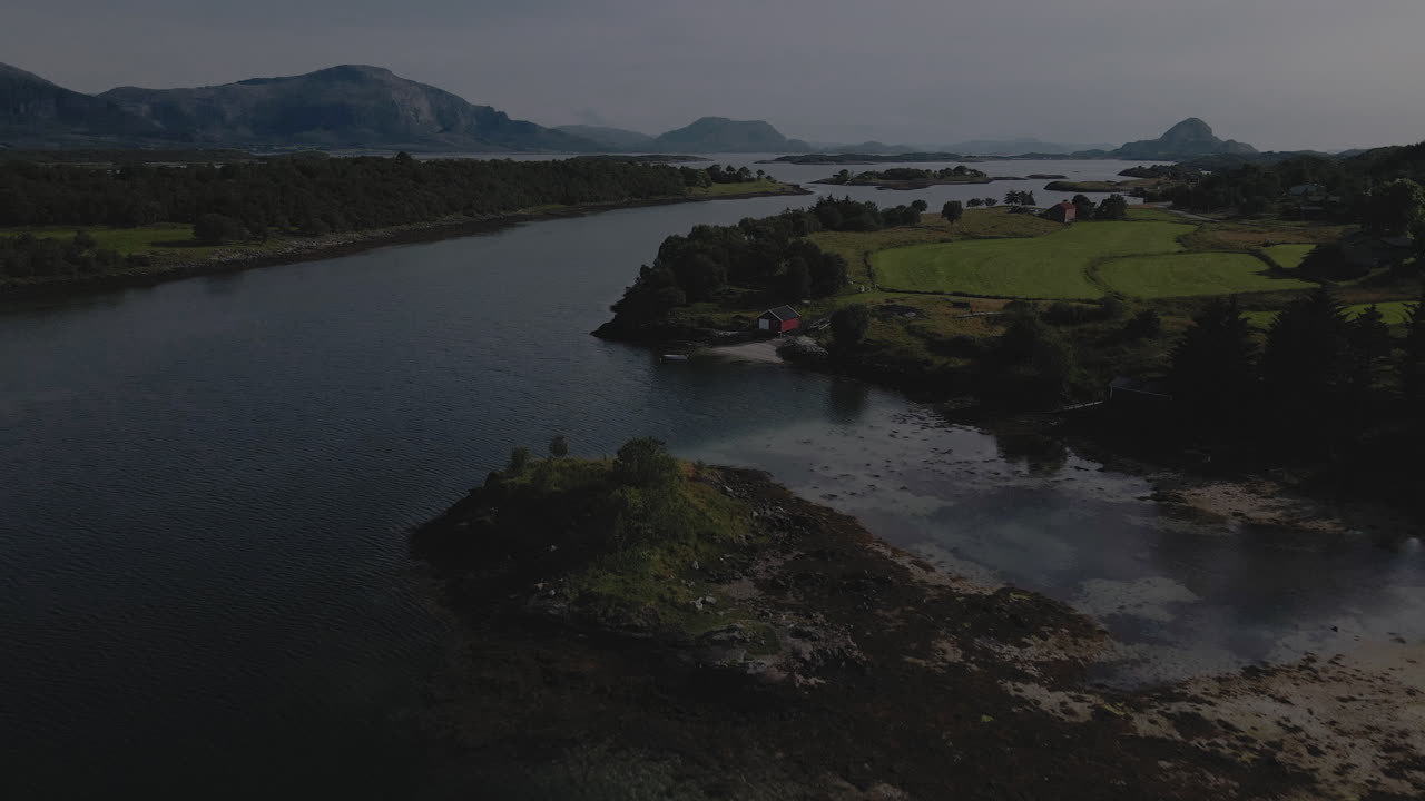 Scenic View Of Fjord, Boat Houses And Coastline In Nordland County, Norway - aerial drone shot