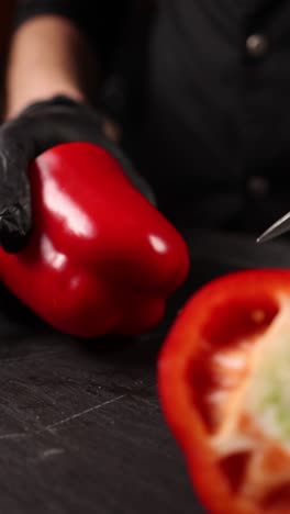 chef preparing red bell peppers