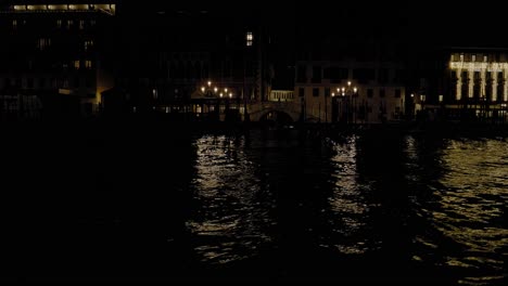 view from a gondola of the streets of venice during the night