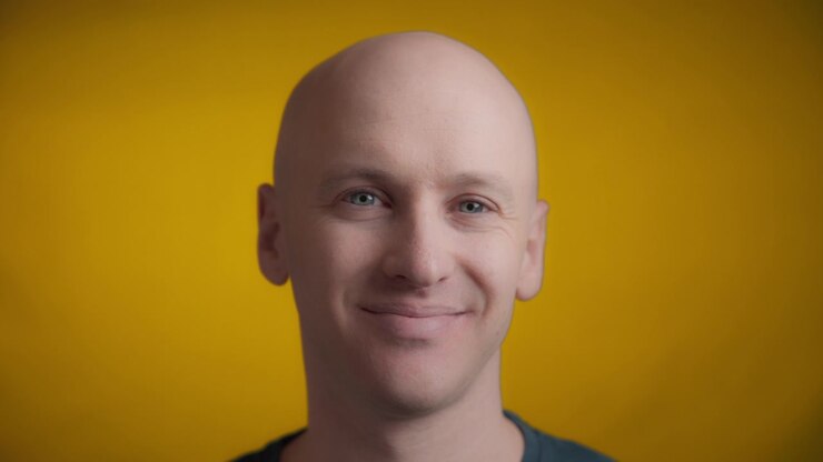 Smiling male looking at the camera