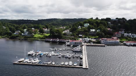 boats at marina by lyckorna brygga ferry terminal in ljungskile, bohuslan, sweden