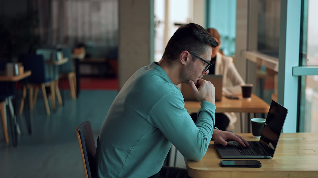 Business People Working in a Cafe