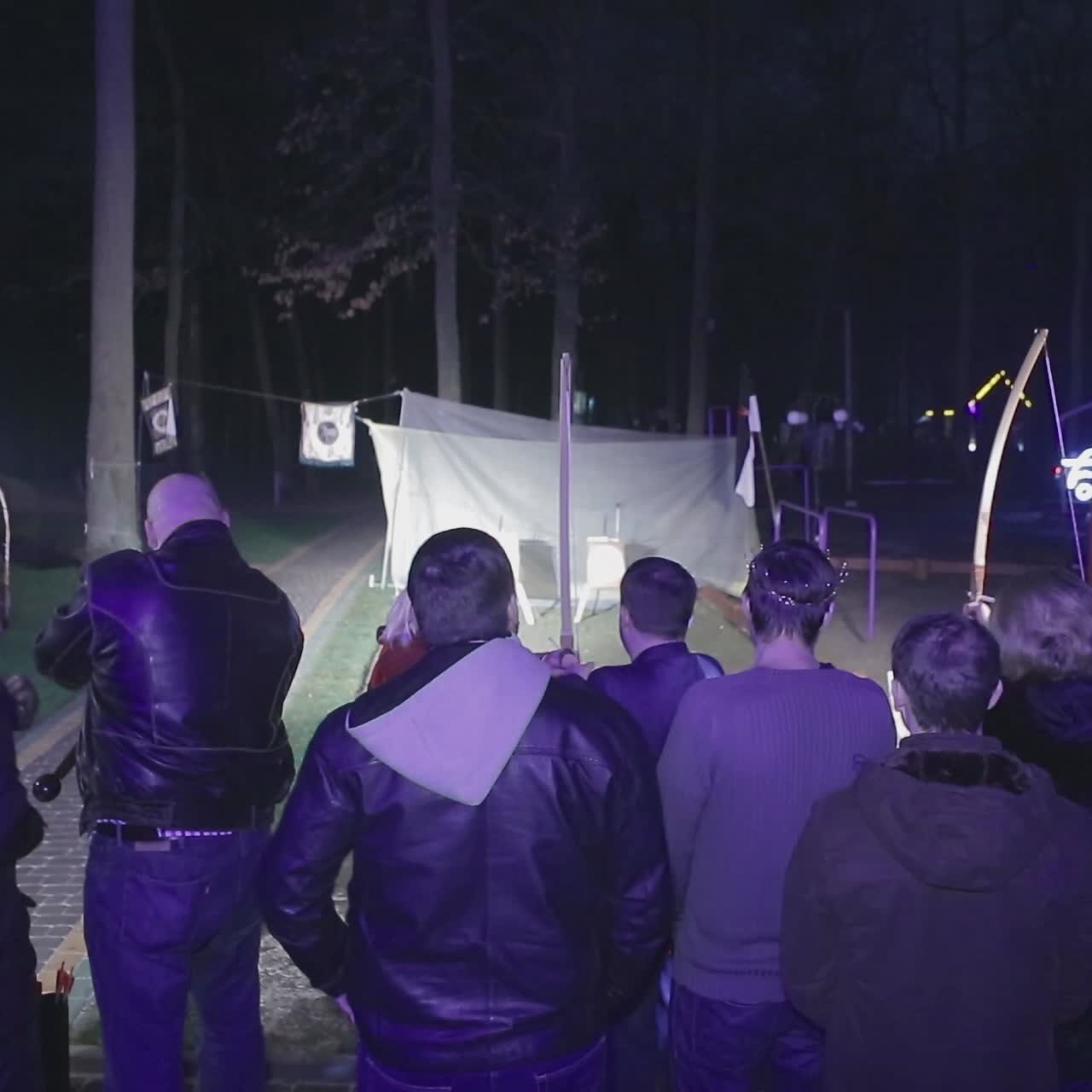 People Aims A Bow At A Target