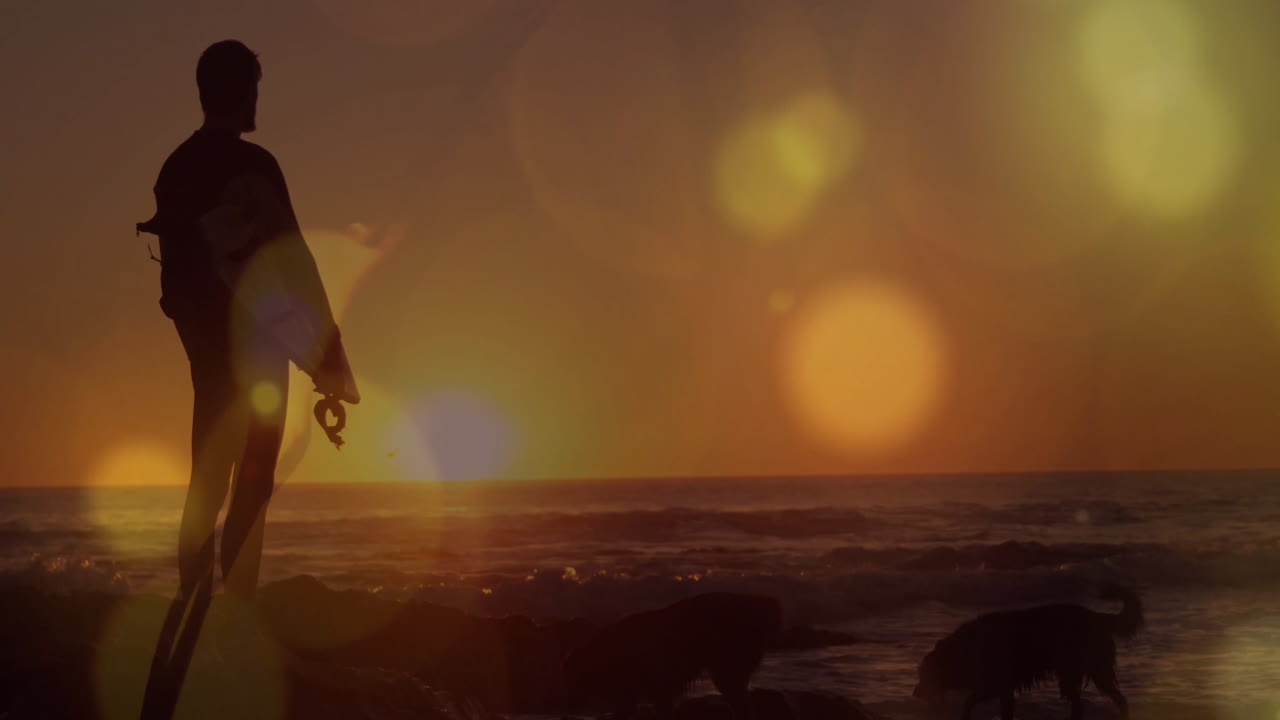 Animation af lyspletter over kaukasisk mand ved havet