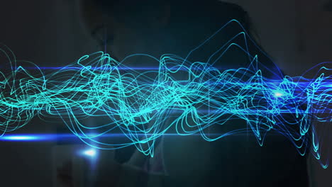 animación de ondas azules que se mueven sobre una red de conexiones