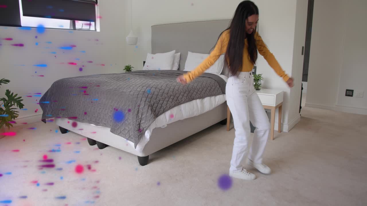Woman entering room, walking toward camera and spinning, dancing with confetti dots for fashion