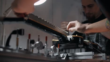 guitar neck repair in a workshop