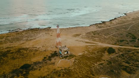 aerial view of a lighthouse in the desert and the sea, the northest point in colombia and southamerica, puntagallinas