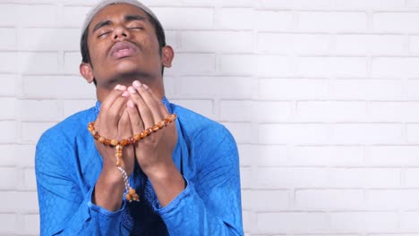 young man praying