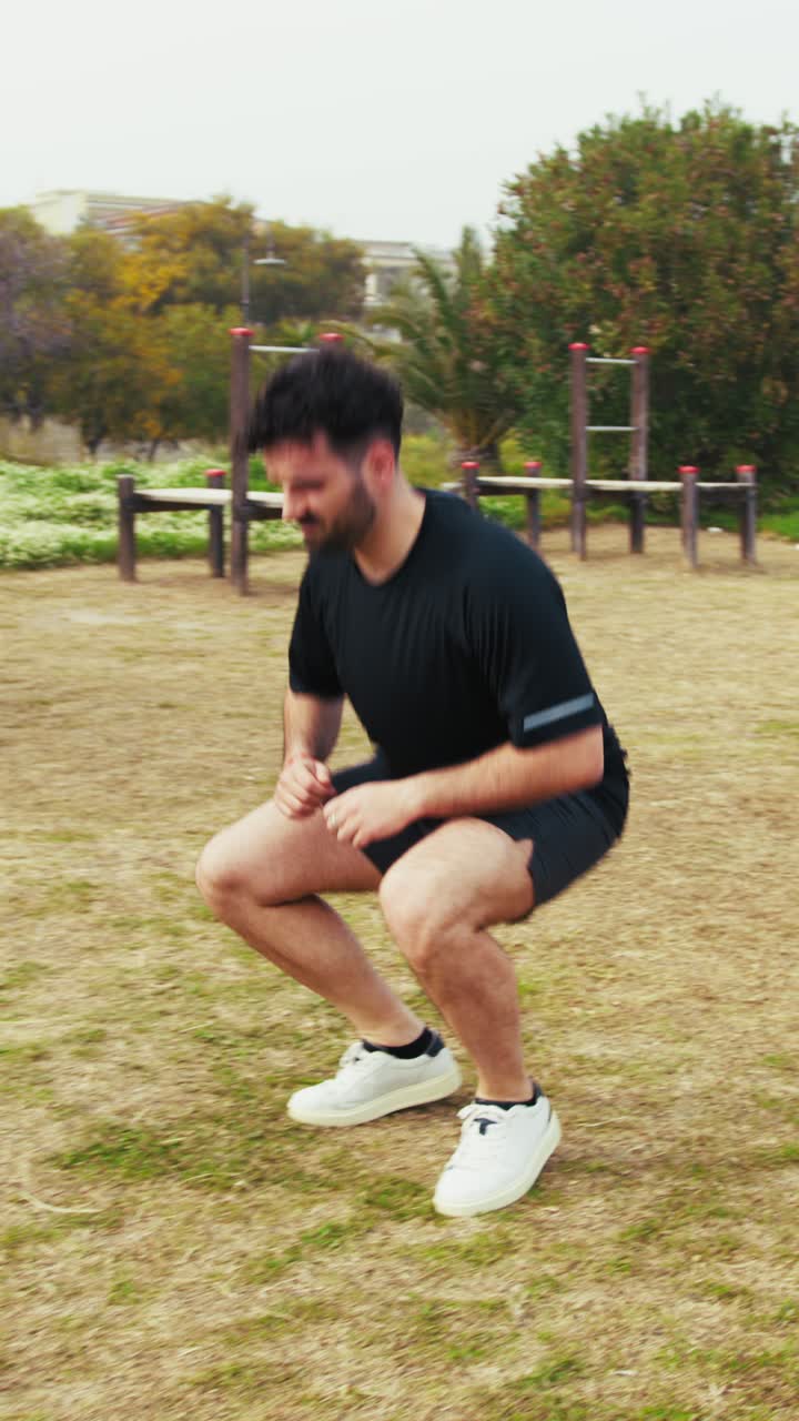 Athlete Trains At The Park Doing Warm Up With Long Jumps