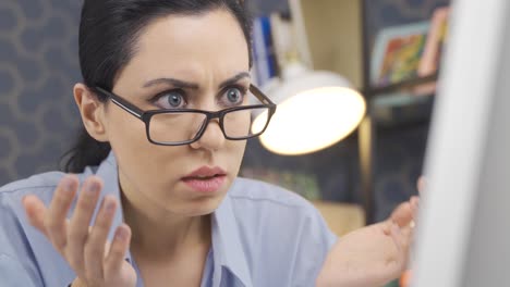 business woman is puzzled and doing mysterious work in the office.