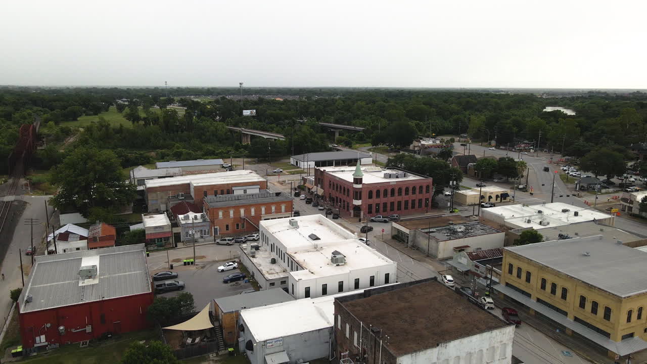 Aerial Shot of Richmond, Texas, USA, Reversing to Reveal Water Tower with Town Name