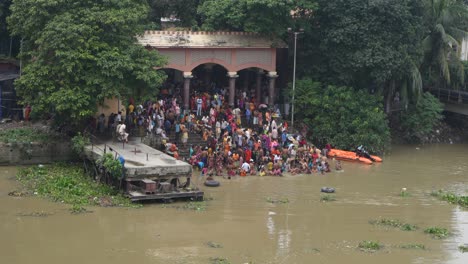 on the eve of durga puja, hindus gather at ganges for bathing and tarpan on mahalaya day.