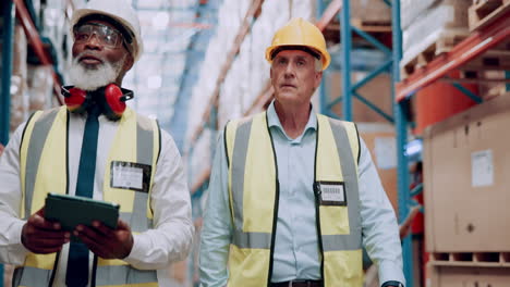 warehouse workers inspecting inventory
