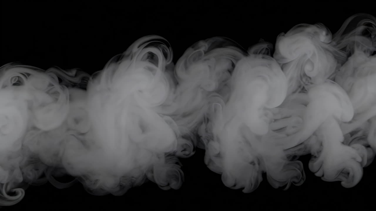 검은 바탕에 회전하는 연기가