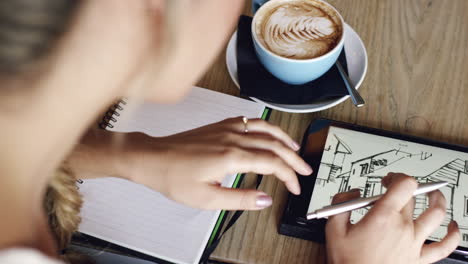 architect woman working in cafe drinking coffee high angle