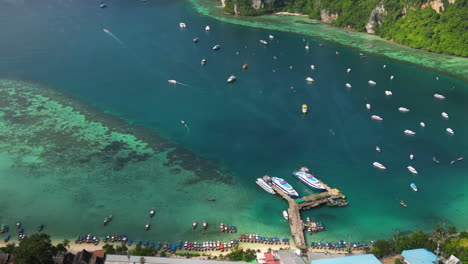 amazing hyperlapse drone shot capturing the busy waterways of koh phi phi island