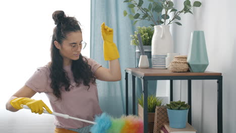 woman cleaning a shelf