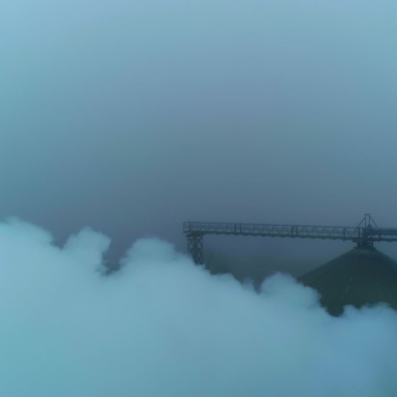 Big agricultural grain elevator. Aerial view of industrial elevator construction