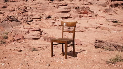 old-wooden-chair-on-rocks-of-Grand-Canyon