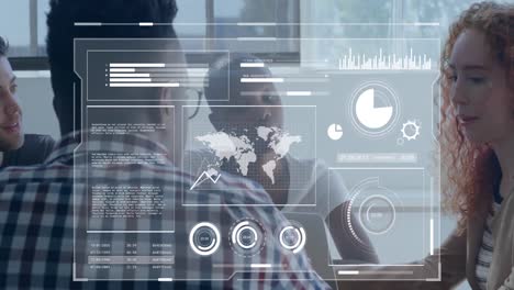 Animation-of-map,-graphs,-map,-loading-circles,-diverse-coworkers-sharing-ideas-in-office