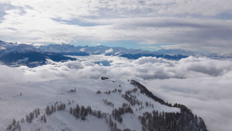 Aerial-shot-in-Switzerland-over-the-town-of-Crans-Montana,-Valais