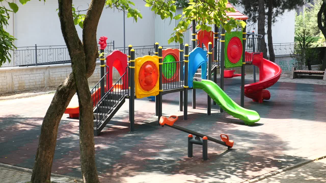 Playground with slides and seesaw