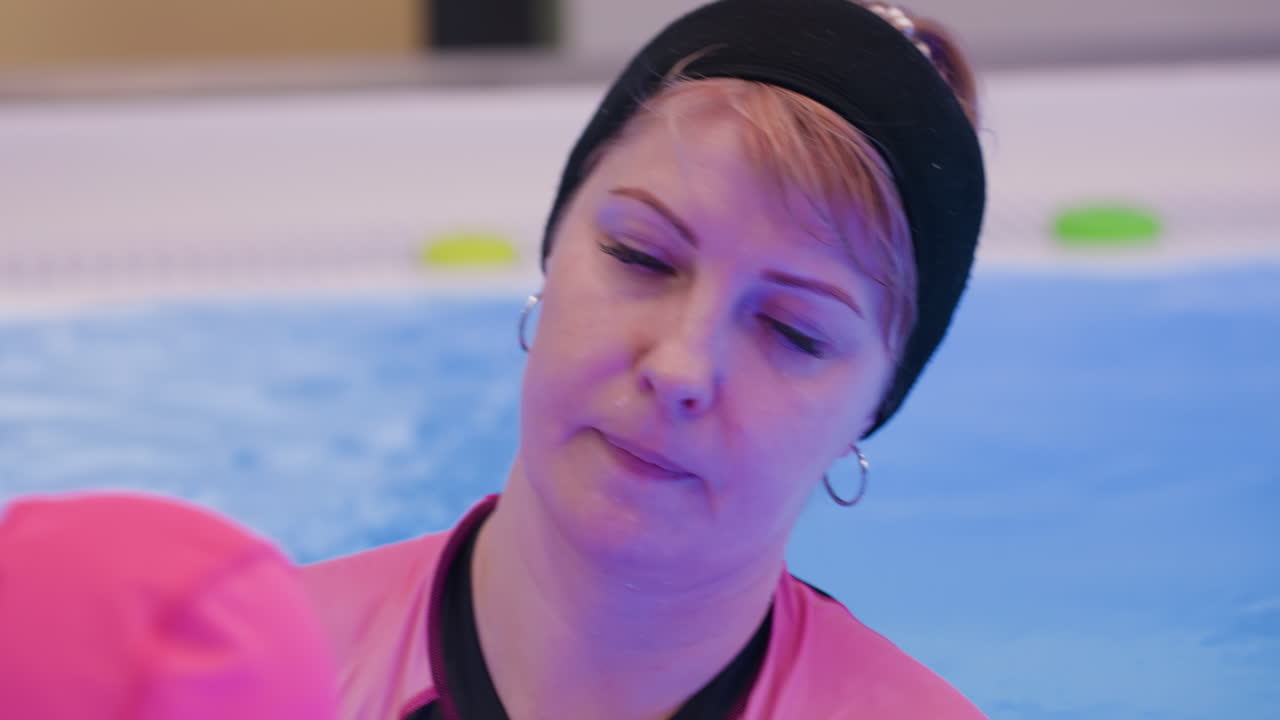 White lady slowly turns while muttering words, expressive face showing subtle emotions, indoor setting with soft light highlighting gestures, moment captured in natural manner emphasizing casual mood