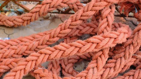 deployed old orange color mooring halyard