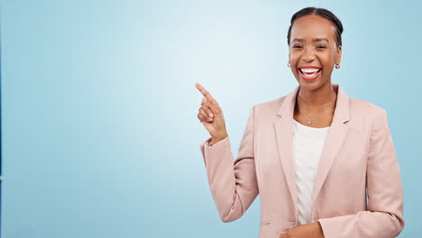 black woman in business, pointing at mockup