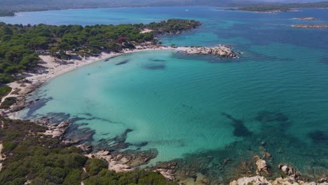 Steady-landscape-clip-over-an-exotic-beach-in-Vourvourou,-Haklidikin-in-northern-Greece-on-a-clear-summer-day