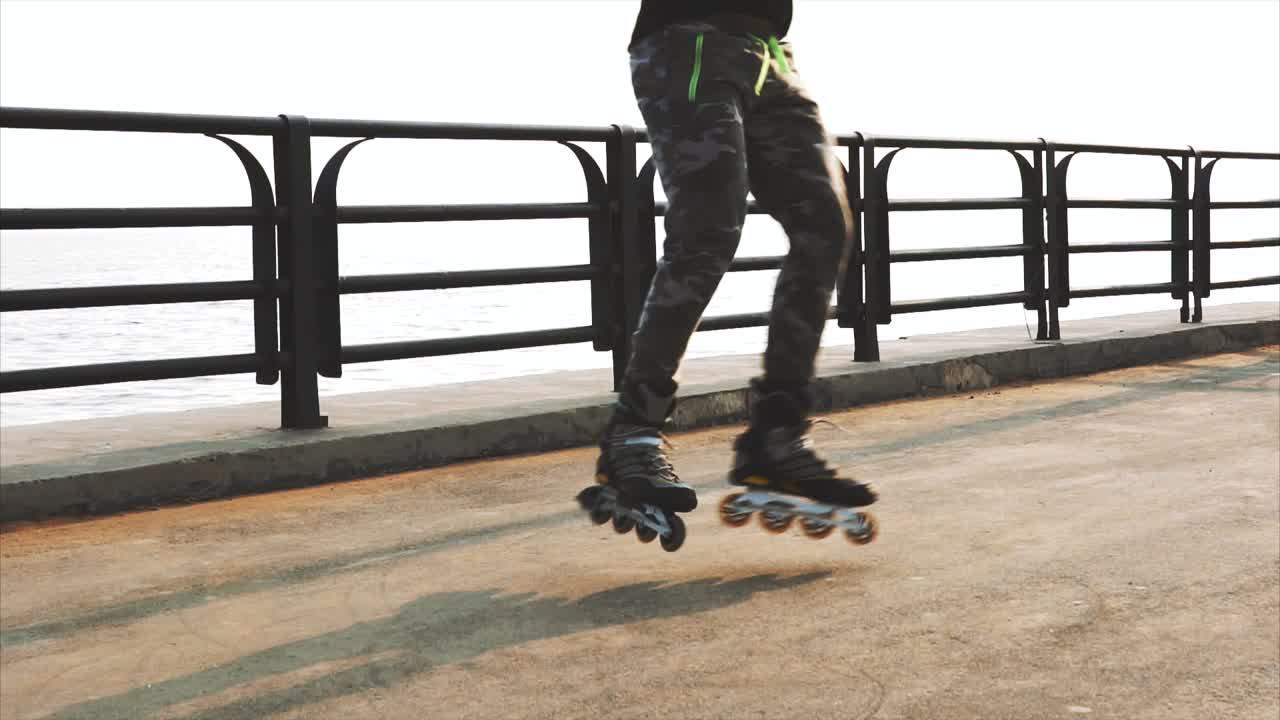 Person Rollerblading at Coastal Walkway
