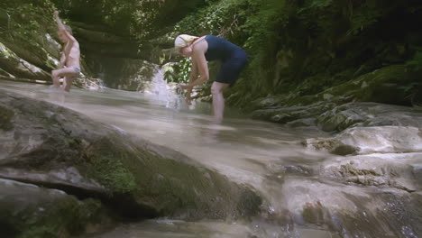 family fun in a mountain stream