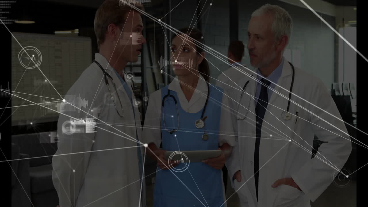Medical staff reviewing patient data on tablet in corridor, featuring network-style data graphics