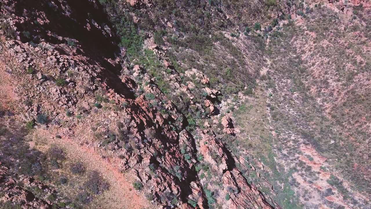 Mt Sonder - Central Australia. Top down aerial flyover - rotating - cliffs, ravines and gorges. Filmed on DJI Mavic Pro.