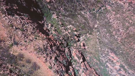 mt sonder - central australia. top down aerial flyover - rotating - cliffs, ravines and gorges. filmed on dji mavic pro.