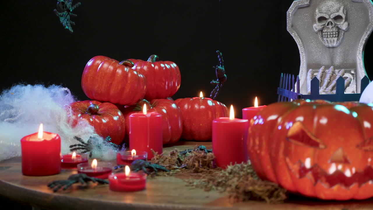 Halloween Decorations with Pumpkins, Skulls, and Candles