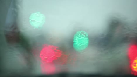 close-up of water droplets on glass, rain go away, large raindrops strike a window pane during a summer shower, 4k, rain series - 8