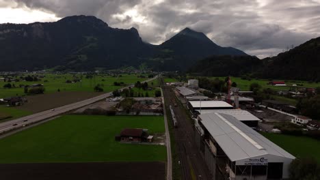 scenic landscape with rautispitz mountain in background in switzerland - aerial drone shot