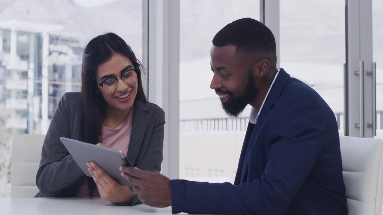 two businesspeople discussing something