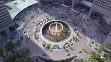 drone footage of top view of the fountain of wealth as the largest fountain in the world at singapore. it is located in one of singapore largest shopping malls.