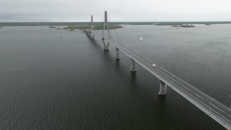 Tranquil-View-Of-A-White-Car-On-Replot-Bridge-In-Finland-During-Autumn-Season-In-October