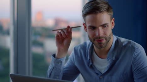 doubtful man searching for ideas in office. thoughtful guy thinking in coworking