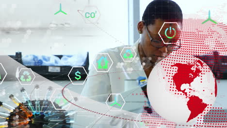 globo giratorio, iconos de computadora sobre científica afroamericana que trabaja en el laboratorio