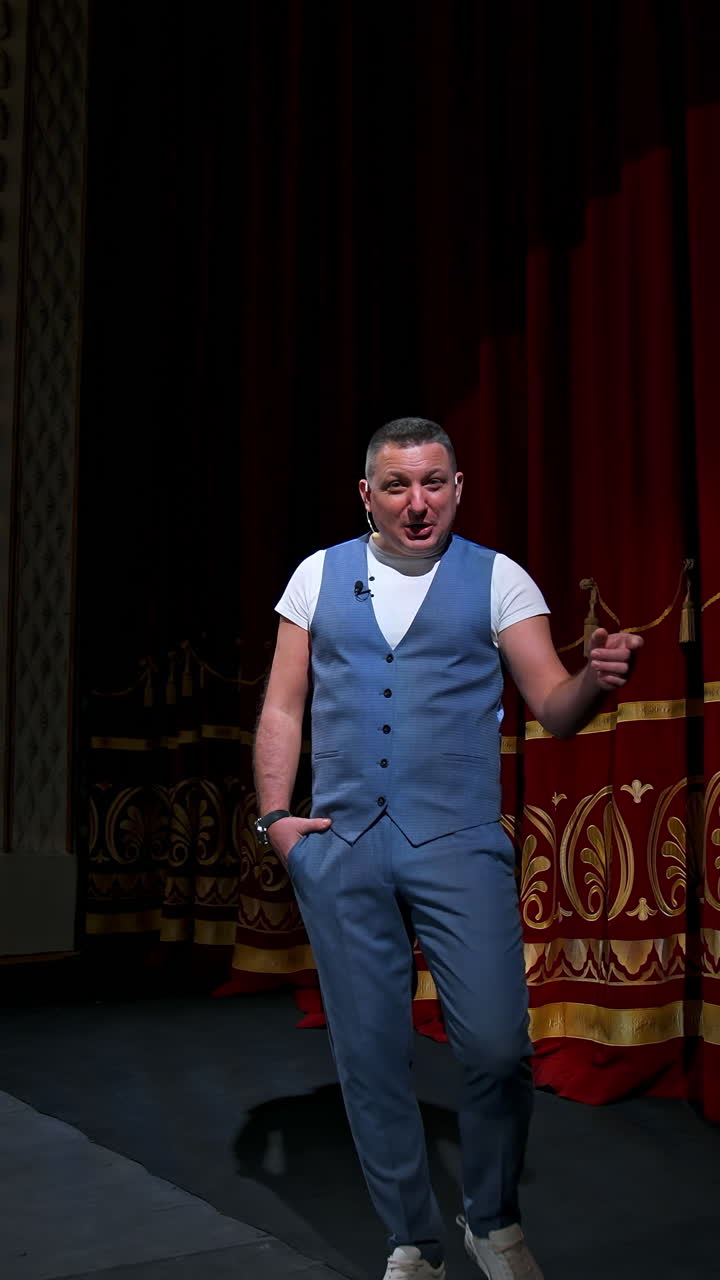 Actor performs on stage. Man on stage during performance in theater